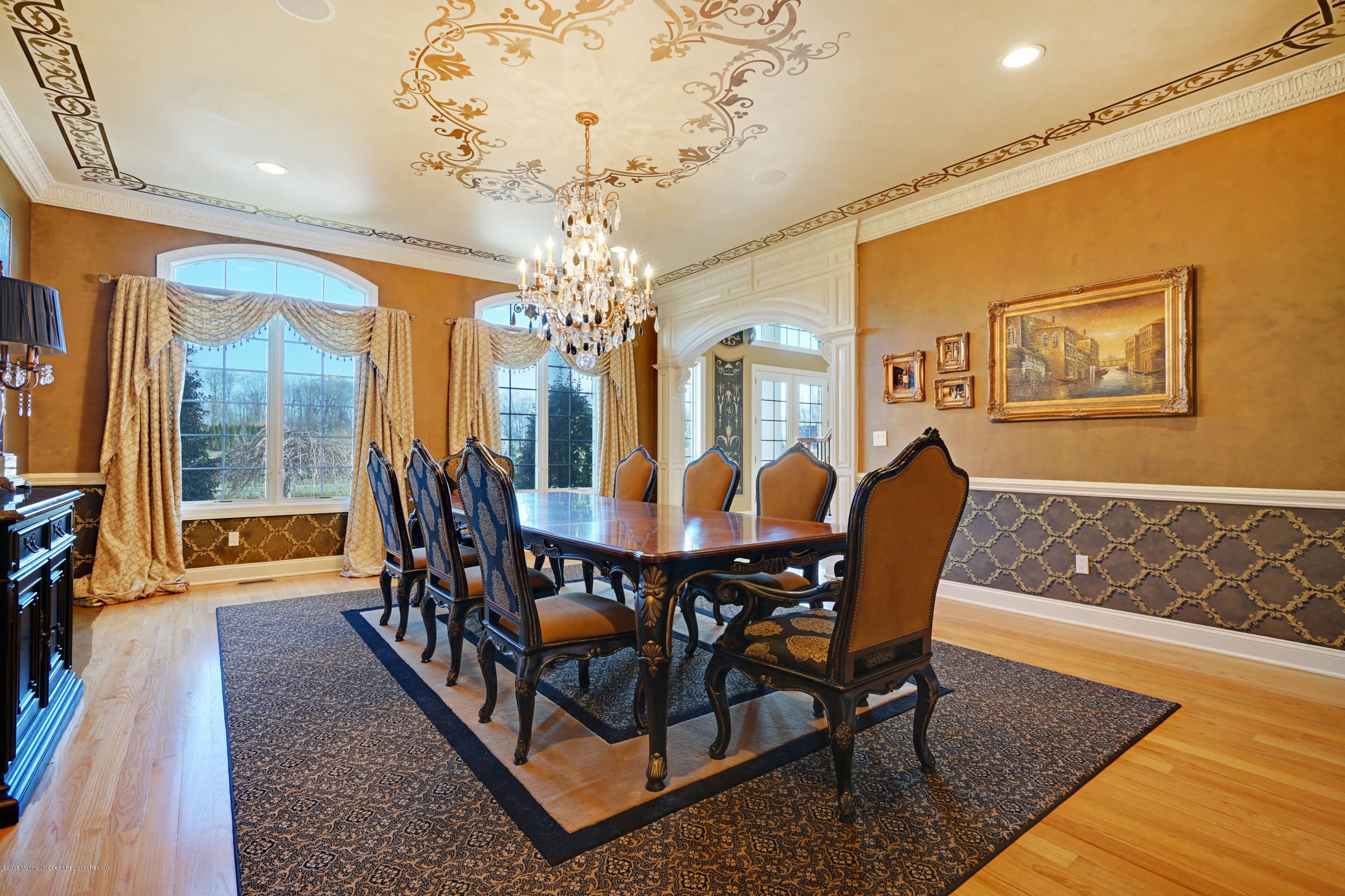 21 Embry Farm Road Marlboro, NJ 07746 - Photo 22 of 68 a view of a dining room with furniture a chandelier and wooden floor