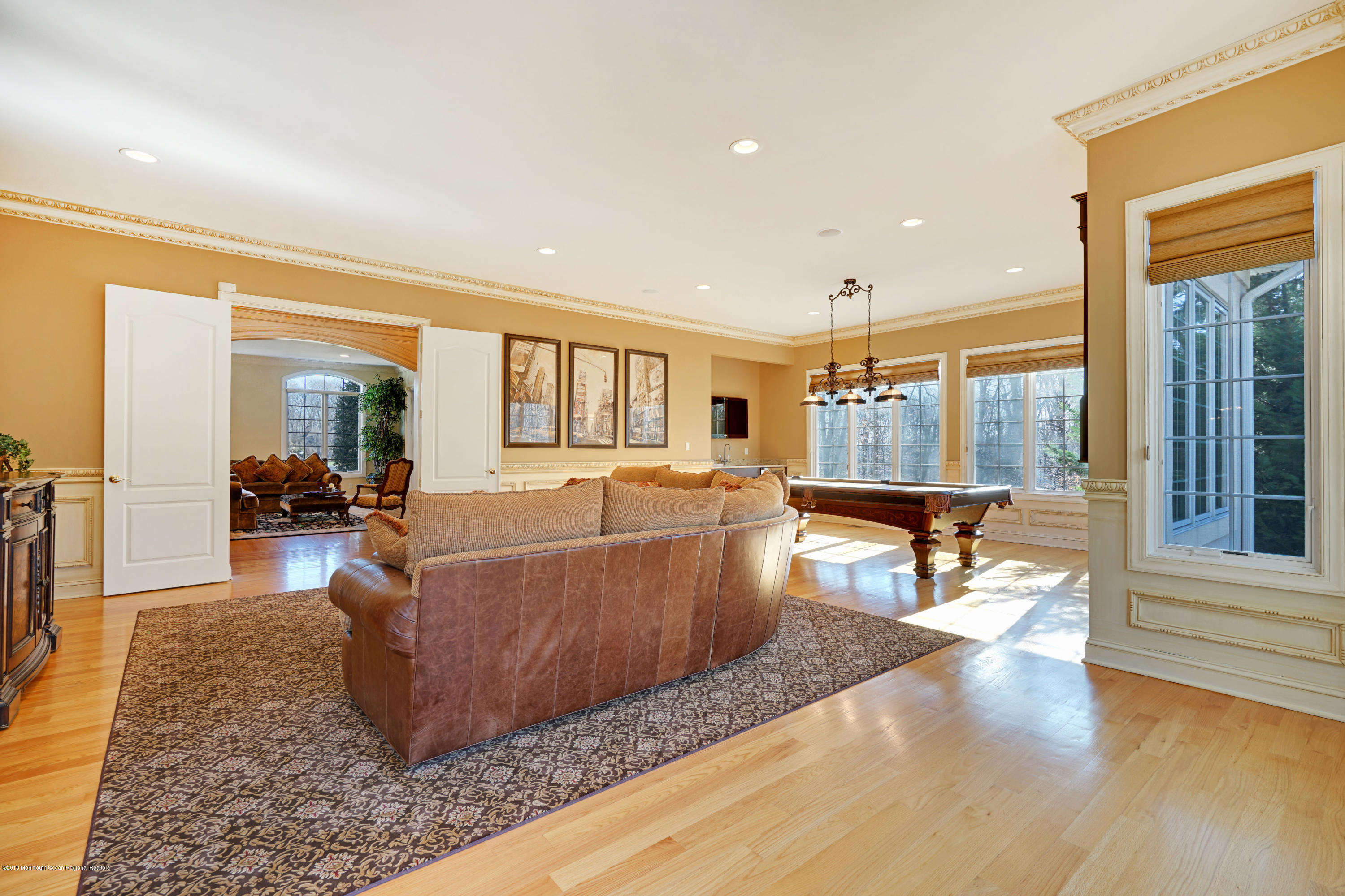 21 Embry Farm Road Marlboro, NJ 07746 - Photo 30 of 68 a living room with furniture and a wooden floor