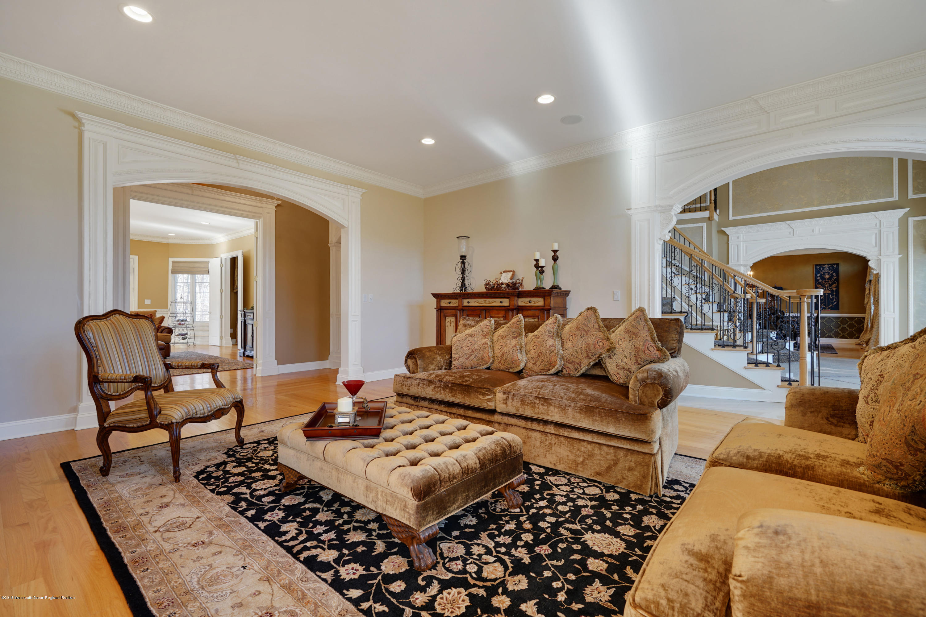 21 Embry Farm Road Marlboro, NJ 07746 - Photo 31 of 68 a living room with furniture and a fireplace