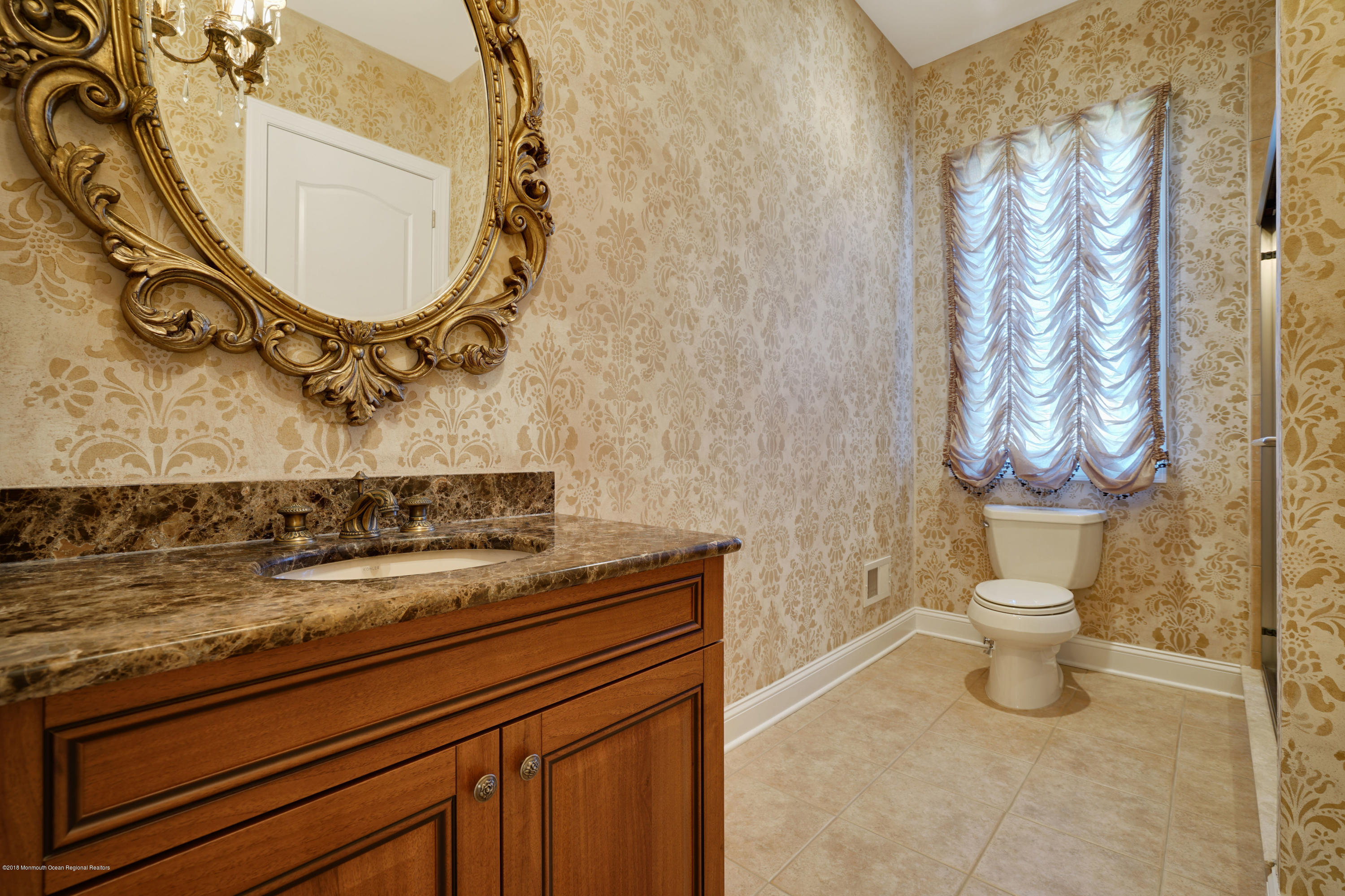 21 Embry Farm Road Marlboro, NJ 07746 - Photo 34 of 68 a bathroom with a granite countertop sink and a mirror