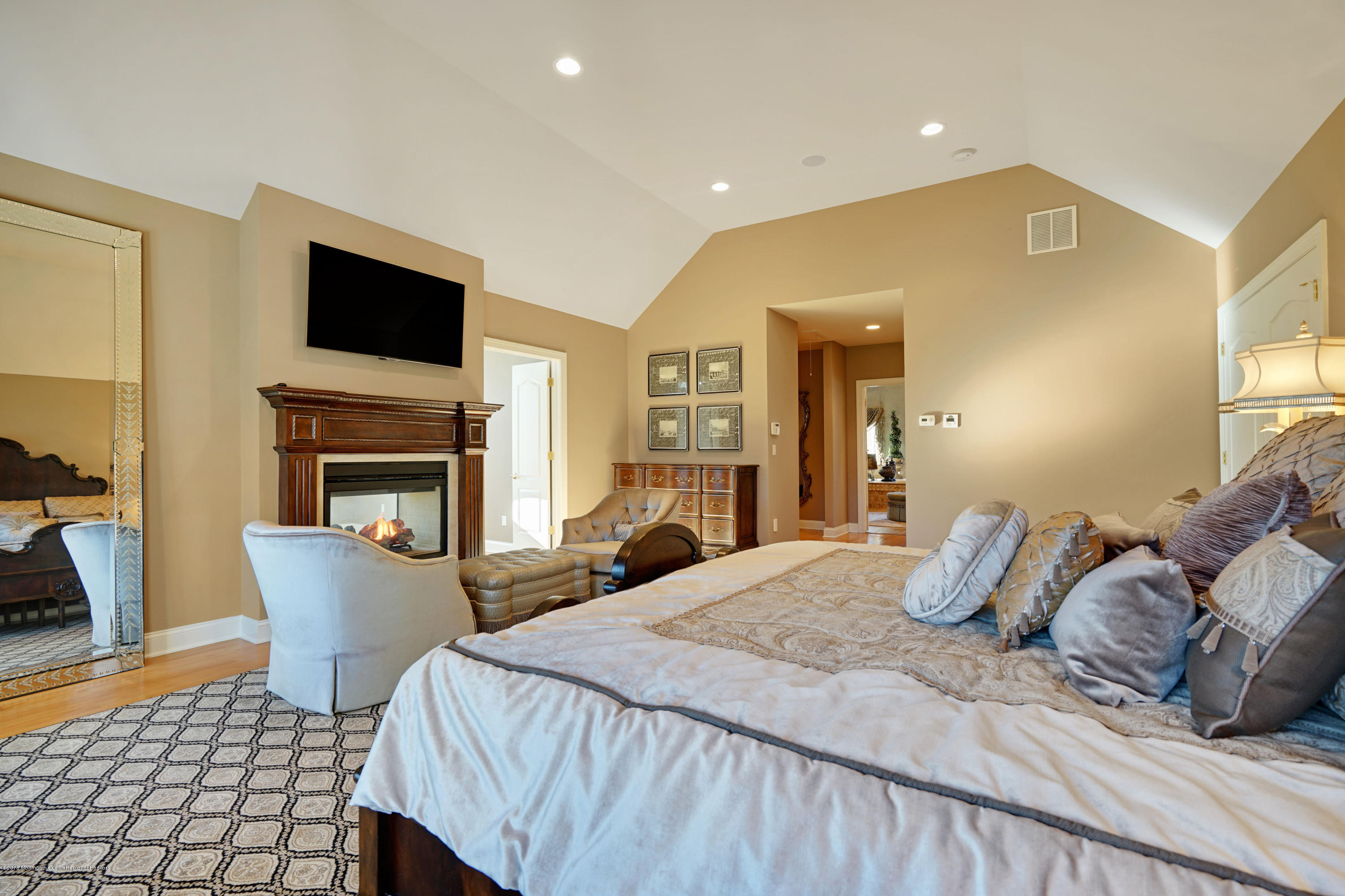 21 Embry Farm Road Marlboro, NJ 07746 - Photo 39 of 68 a bedroom with a bed and a television