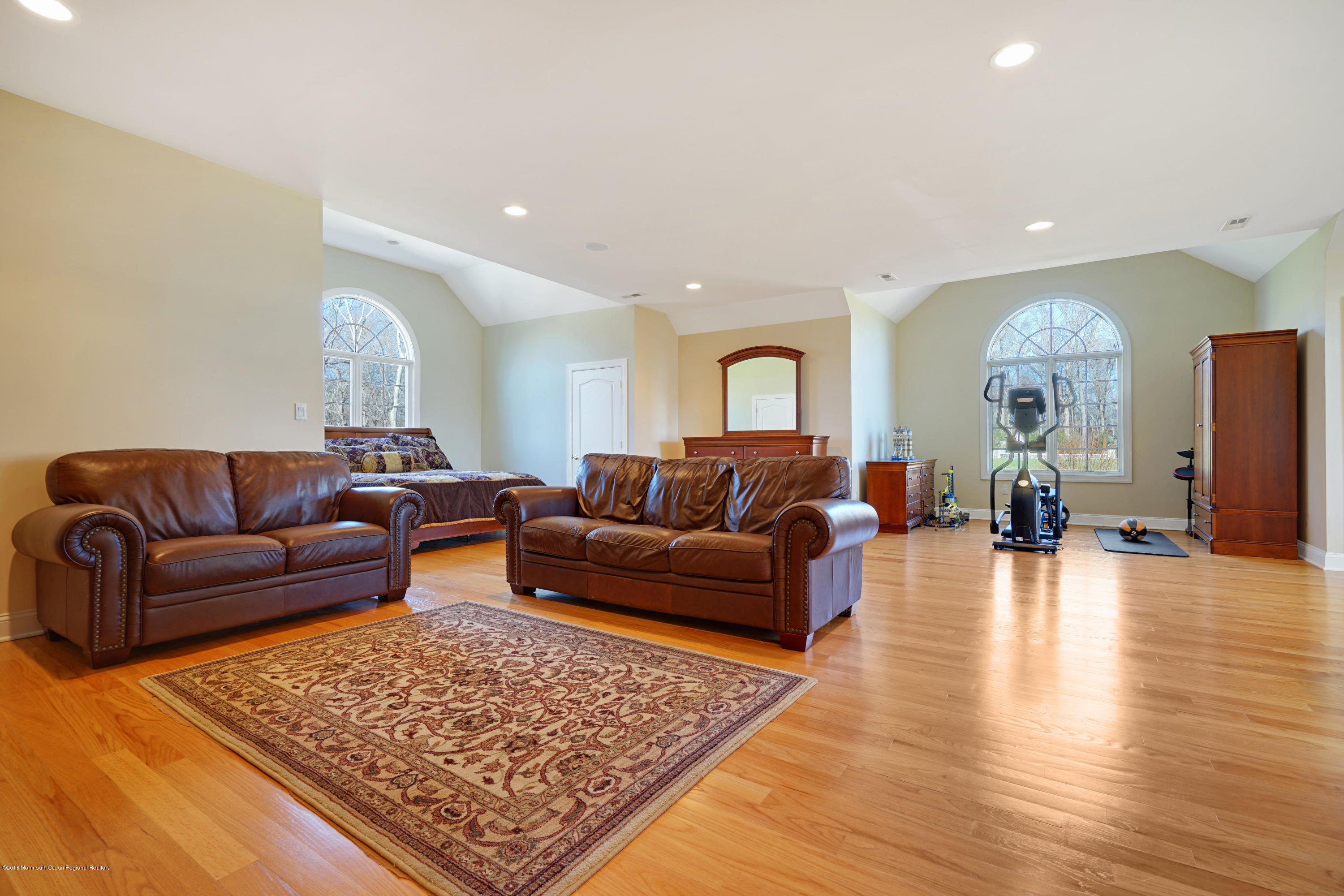 21 Embry Farm Road Marlboro, NJ 07746 - Photo 51 of 68 a living room with furniture and a chandelier