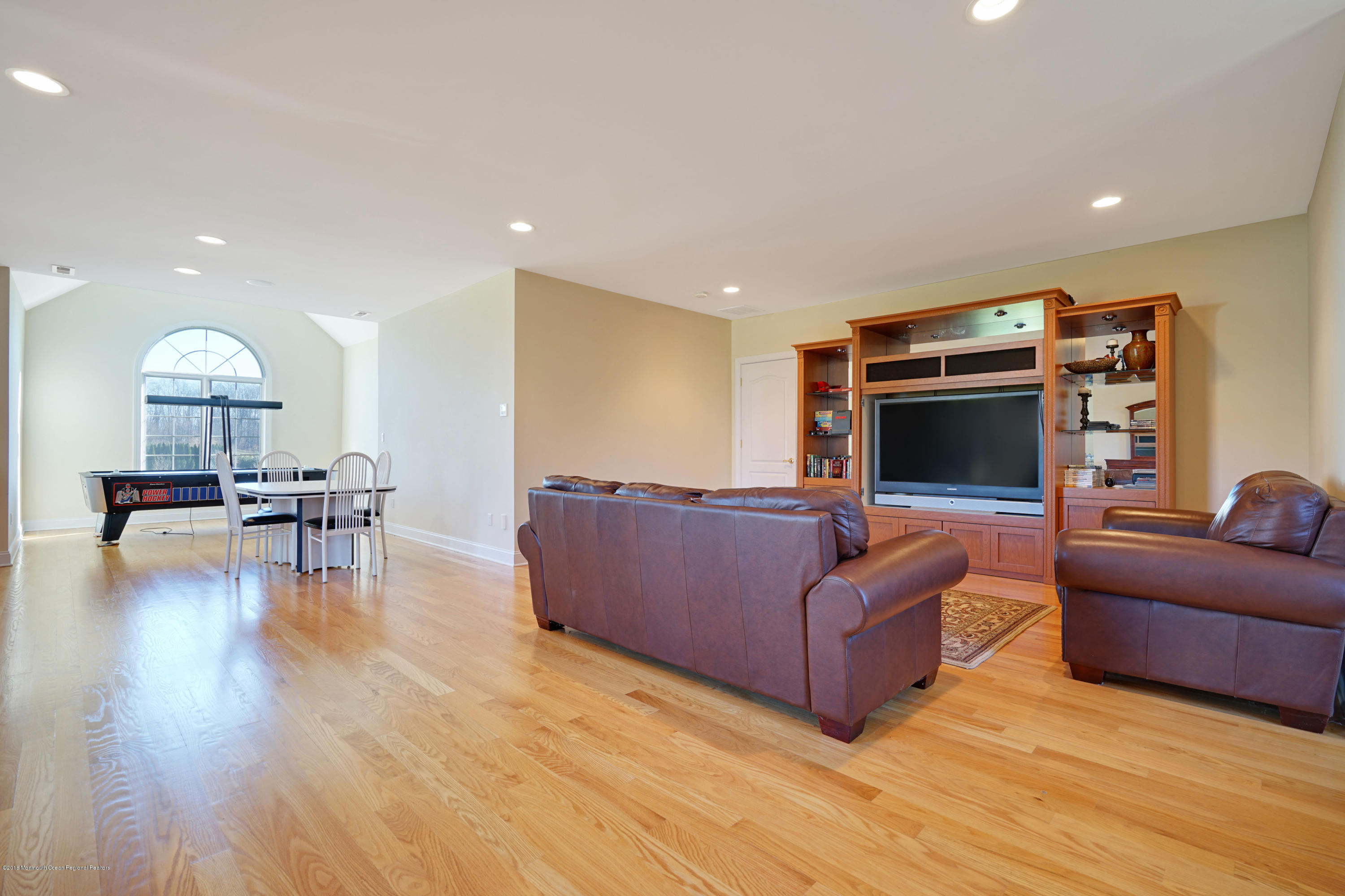 21 Embry Farm Road Marlboro, NJ 07746 - Photo 52 of 68 a living room with furniture and a wooden floor