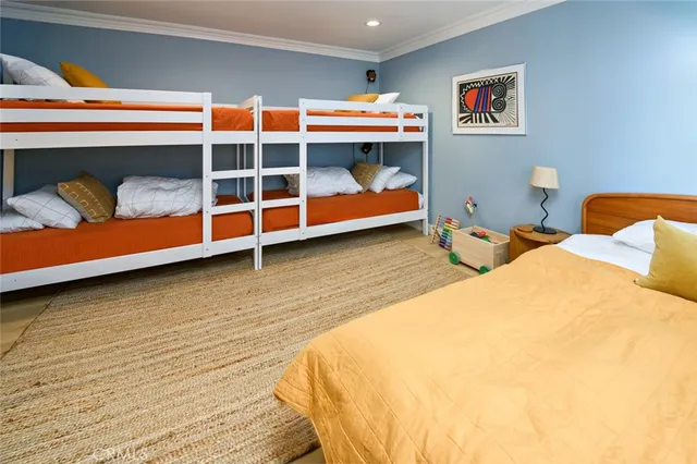 a bed room with a bed and a window