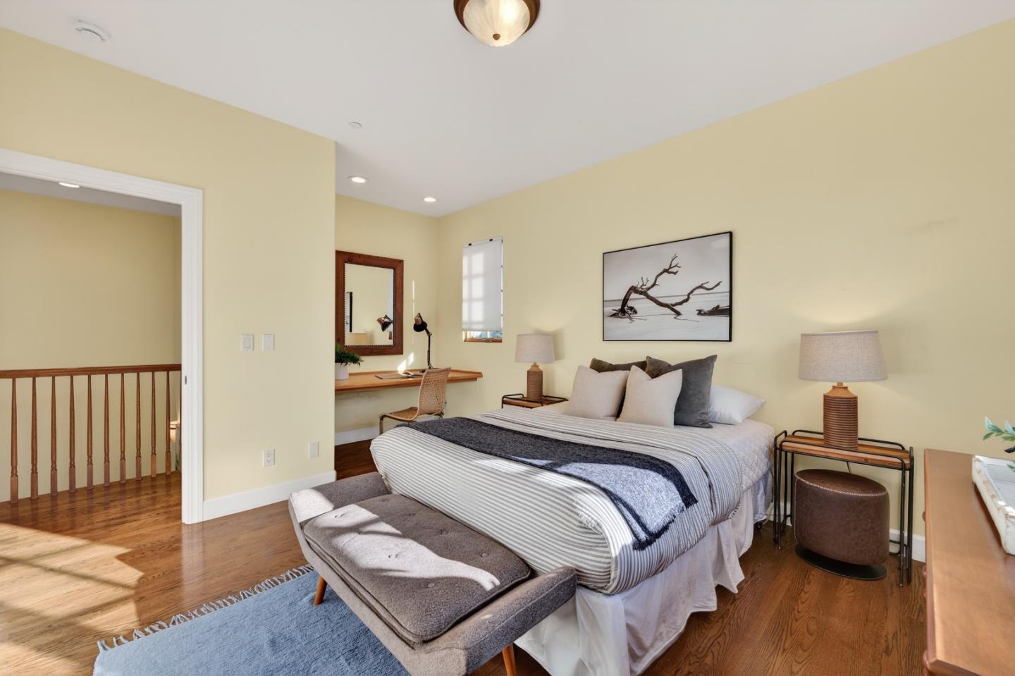 17599 Montebello Road Cupertino, CA 95014 - Photo 42 of 83 a bedroom with a bed and wooden floor