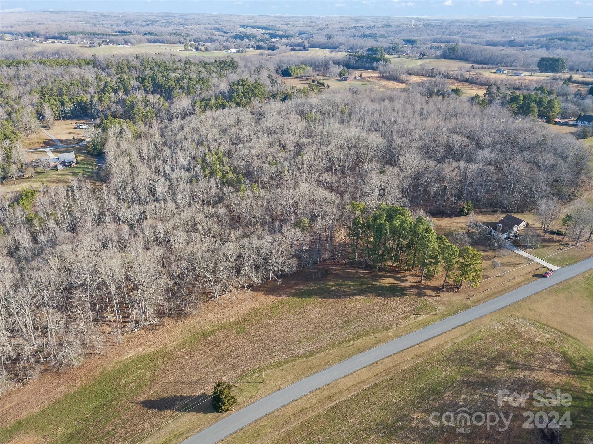 2.5-acres Mann Road Albemarle, NC 28001 - Photo 12 of 15 an aerial view of a house with a yard