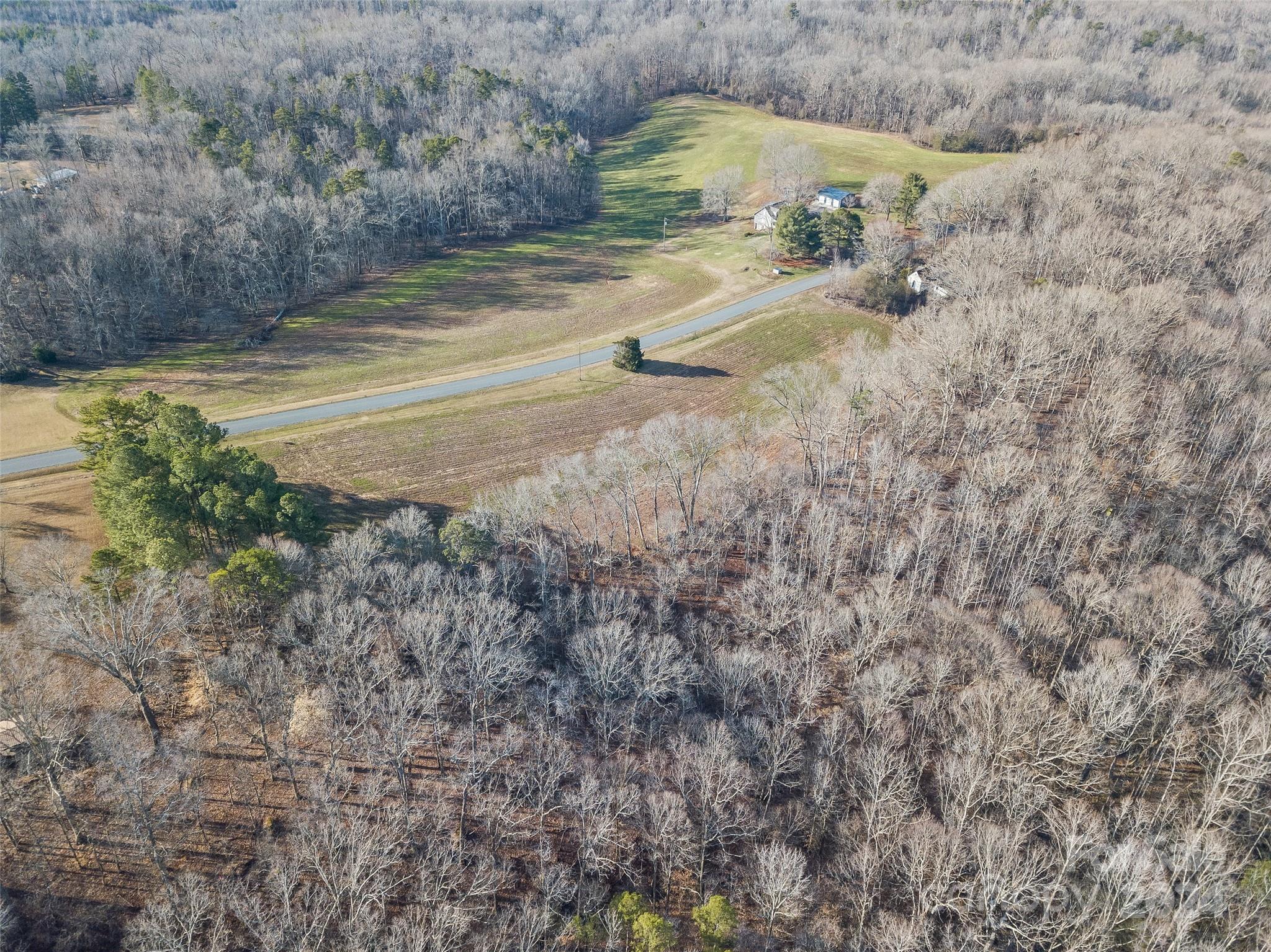 2.5-acres Mann Road Albemarle, NC 28001 - Photo 7 of 15 a view of a yard with an outdoor space