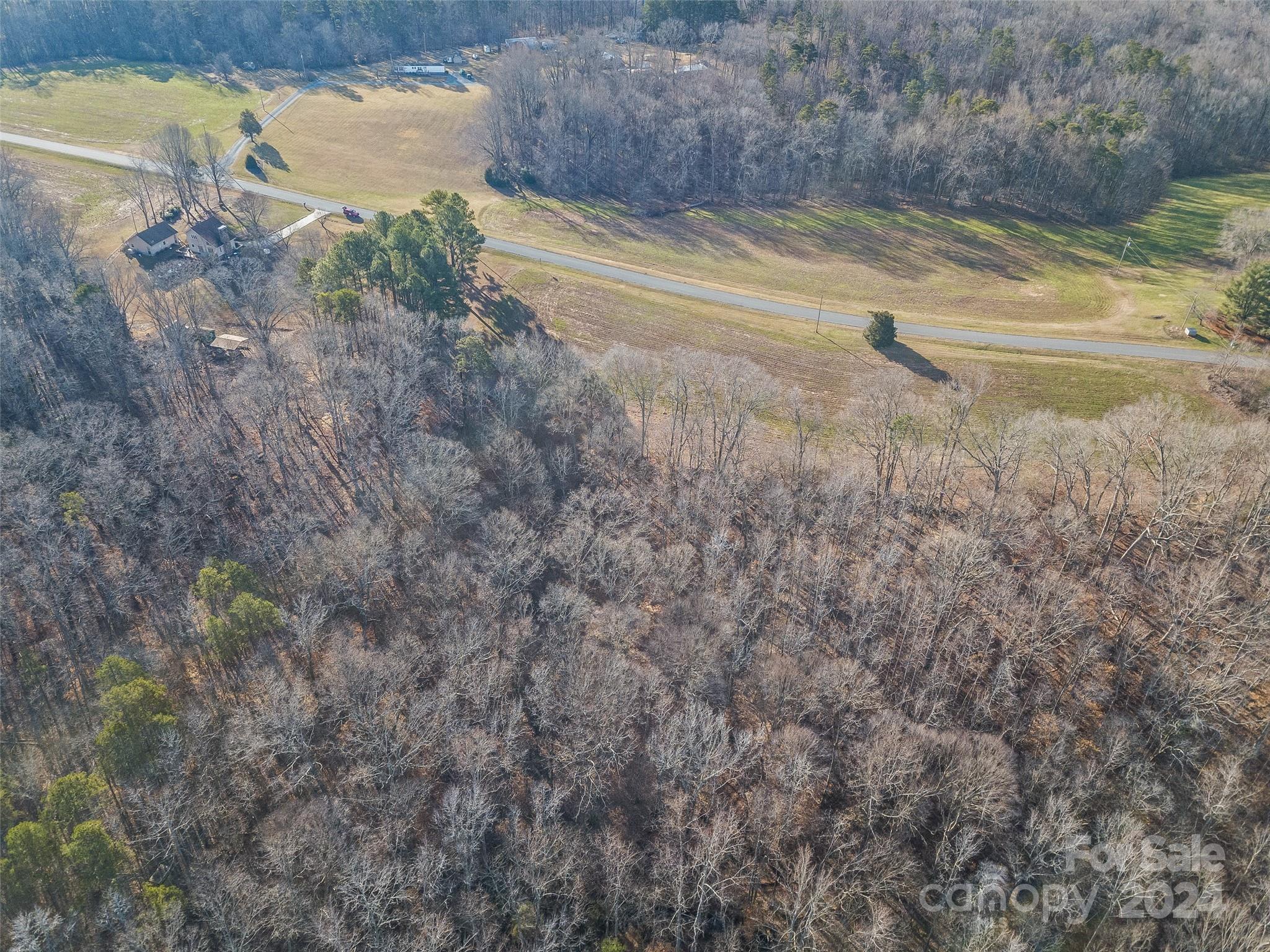 2.5-acres Mann Road Albemarle, NC 28001 - Photo 8 of 15 a view of a backyard of the house