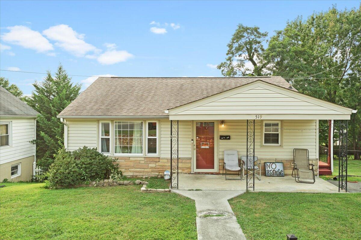 519 Bruffey Street Salem, VA 24153 - Photo 2 of 26 a front view of a house with a garden and yard