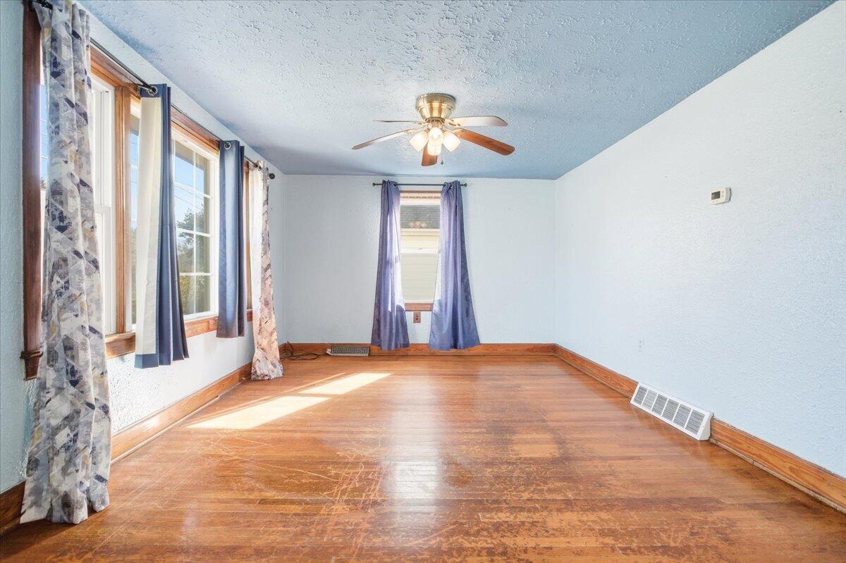 519 Bruffey Street Salem, VA 24153 - Photo 6 of 26 a view of an empty room with a window