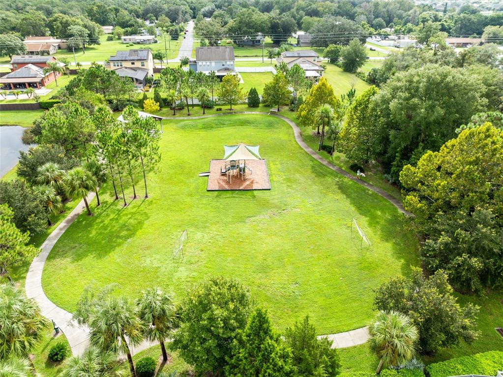 1048 Fountain Coin Loop Orlando, FL 32828 - Photo 37 of 39 a view of a lake with a city