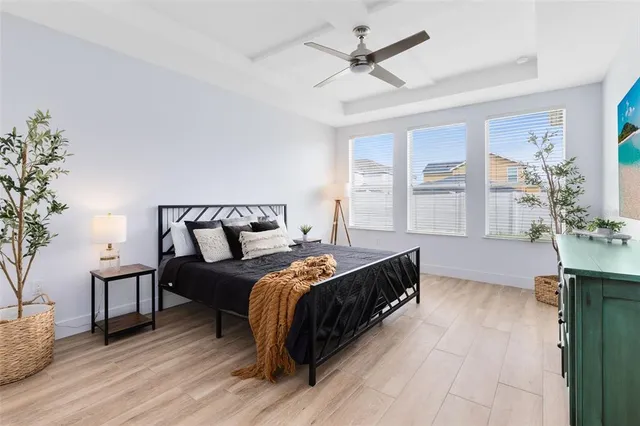 a bed room with a bed and a couch