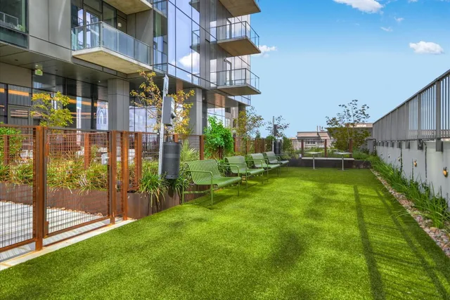 a view of a lobby with furniture and floor to ceiling window