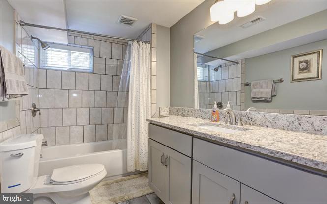 1225 Kathryn Road Silver Spring, MD 20904 - Photo 20 of 25 Modern bathroom with elegant finishes.