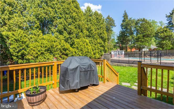 1225 Kathryn Road Silver Spring, MD 20904 - Photo 22 of 25 Sunny deck with lush greenery.