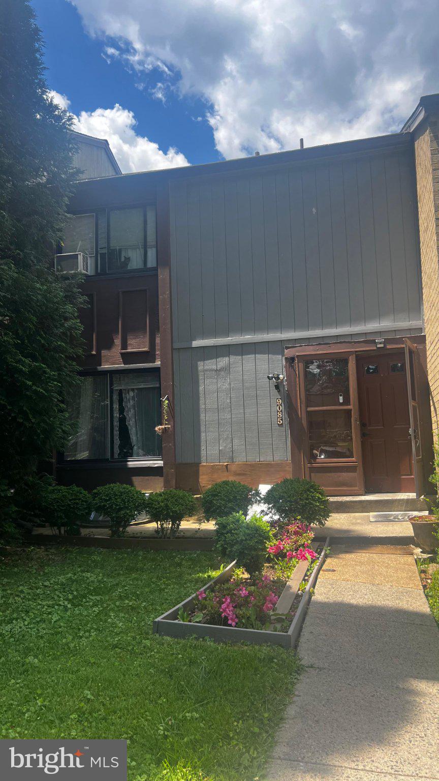 9085 Centerway Road Gaithersburg, MD 20879 - Photo 1 of 1 Charming home with vibrant garden.