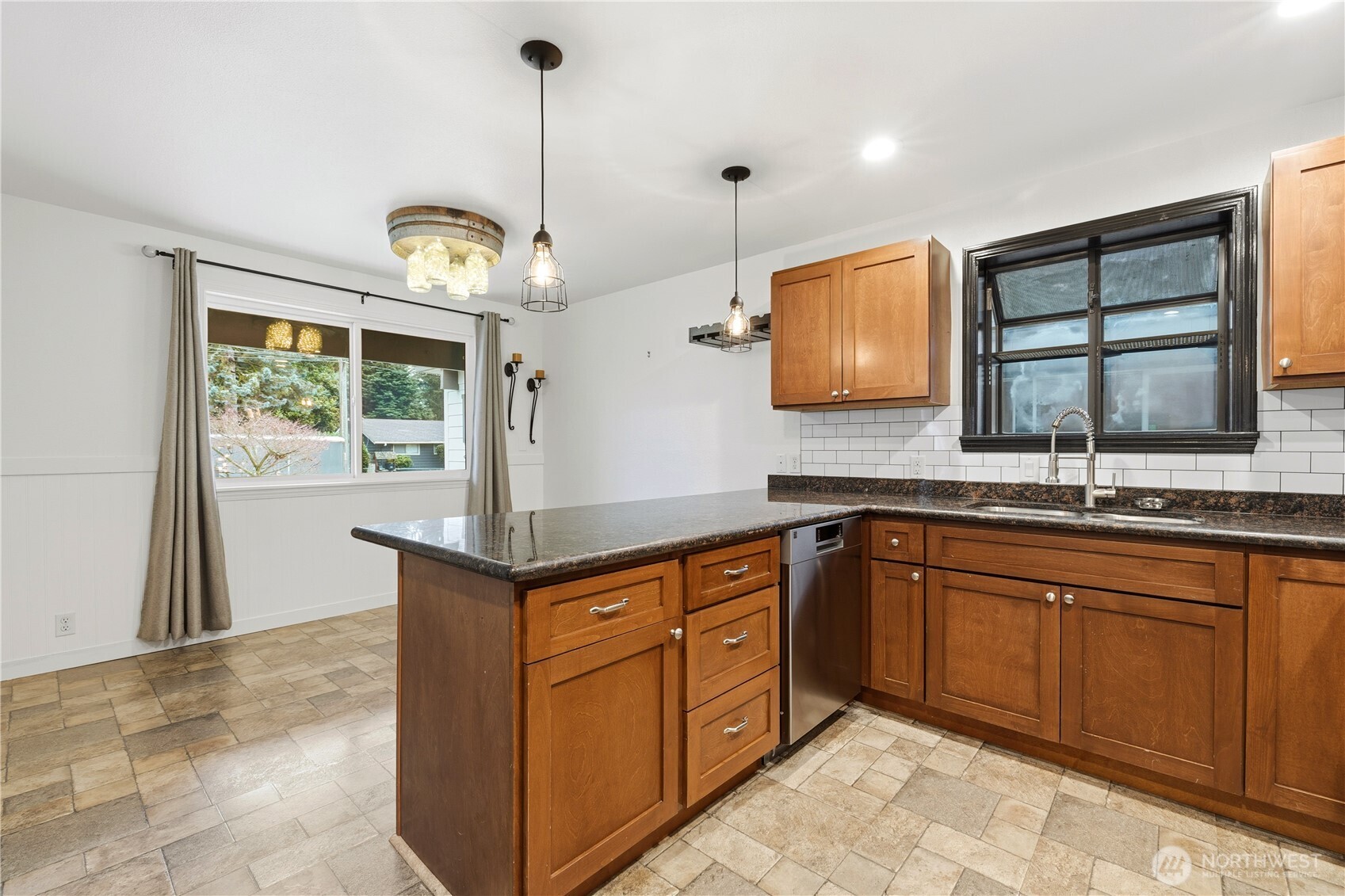 226 Southwest 131st Street Burien, WA 98146 - Photo 5 of 25 a kitchen with a cabinets and window