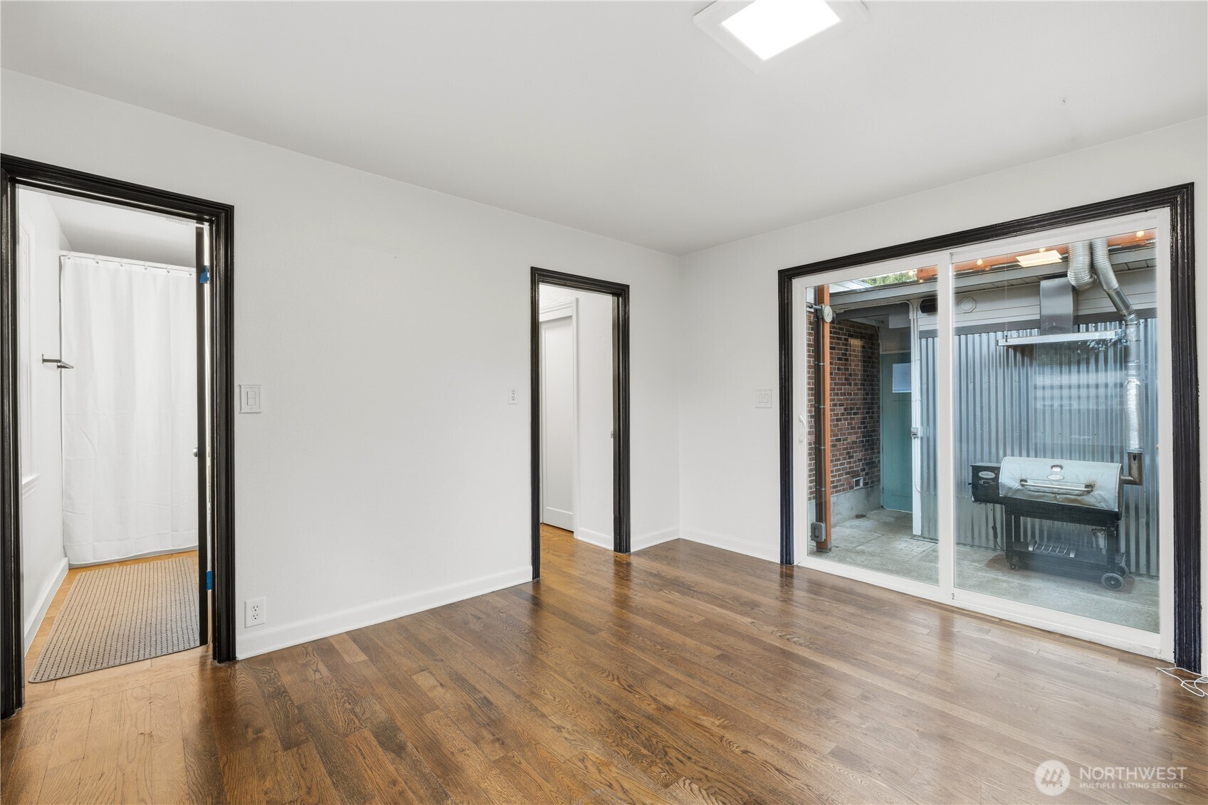 226 Southwest 131st Street Burien, WA 98146 - Photo 9 of 25 wooden floor in an empty room