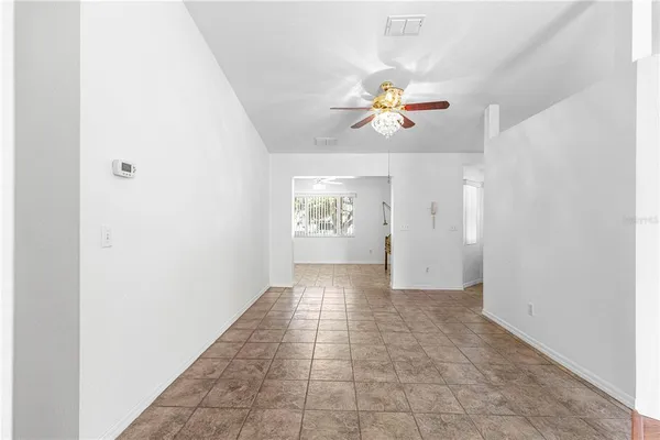 a view of an entryway with a chandelier