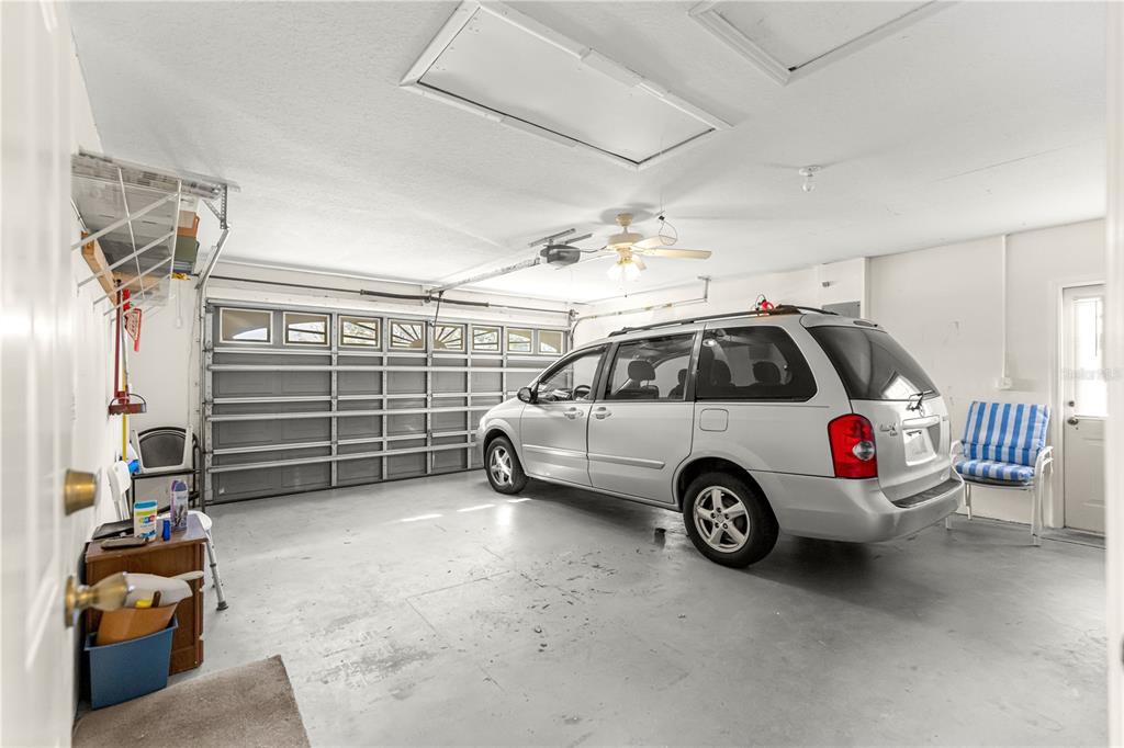 6115 Southwest 104th Street Ocala, FL 34476 - Photo 28 of 39 a view of a car in garage