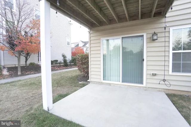a view of a porch with a backyard