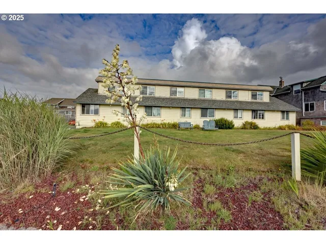 a view of swimming pool with a yard and seating