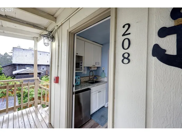 a view of kitchen and living room