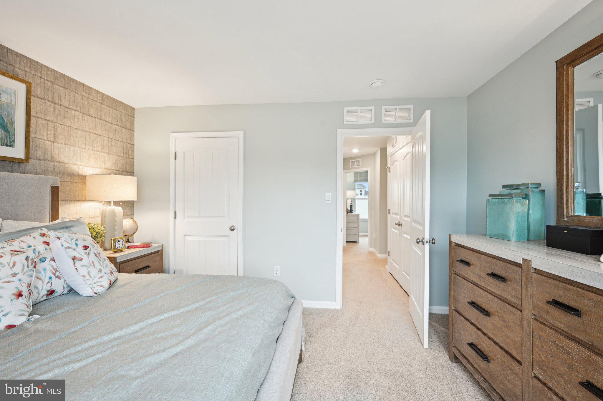 515 Colette Street Ellendale, DE 19941 - Photo 18 of 30 a bedroom with a bed and a dresser