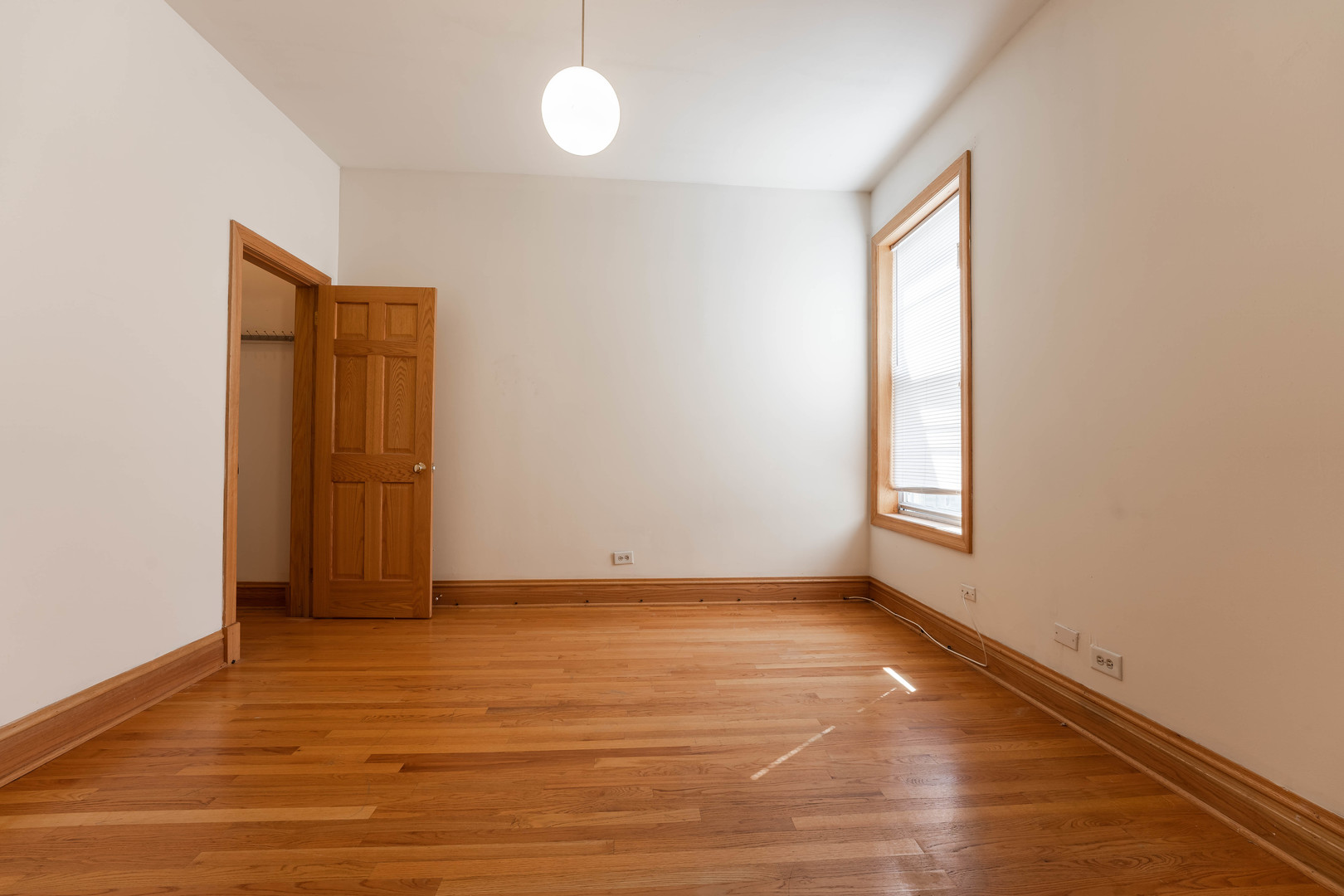 4060 North Sheridan Road, Unit 3S Chicago, IL 60613 - Photo 4 of 15 a view of an empty room and window