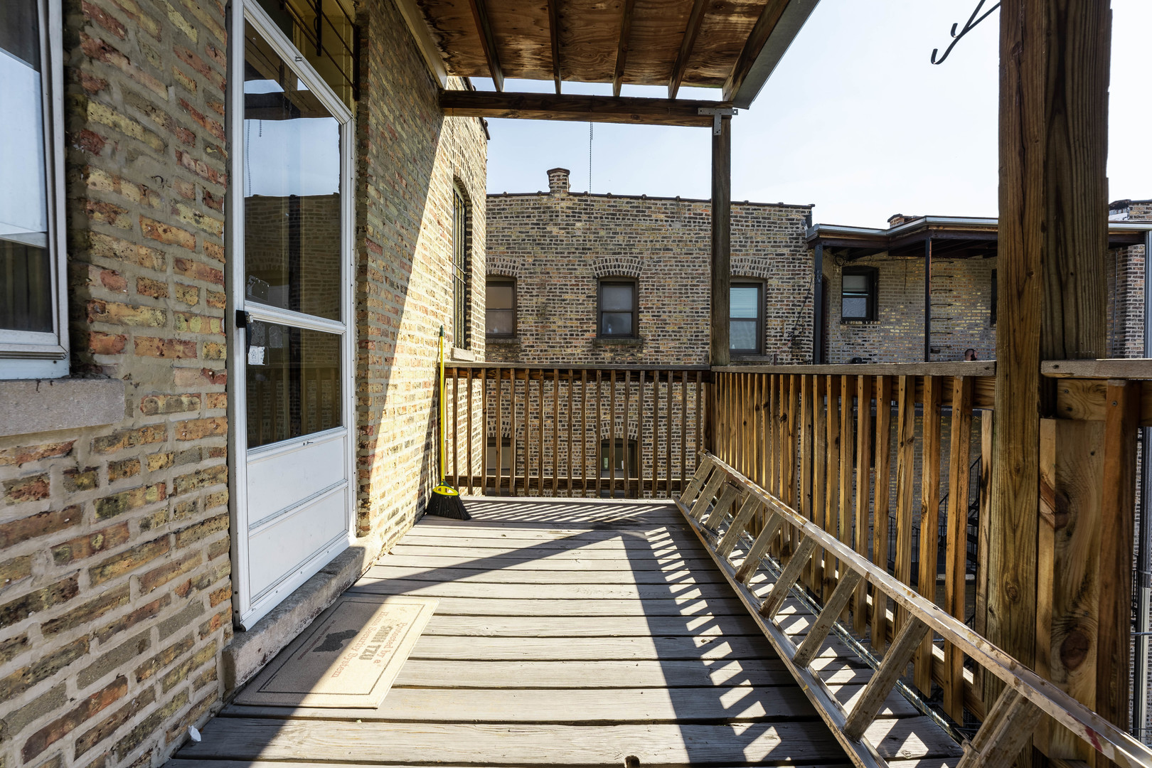 4060 North Sheridan Road, Unit 3S Chicago, IL 60613 - Photo 8 of 15 a view of a balcony with car parked