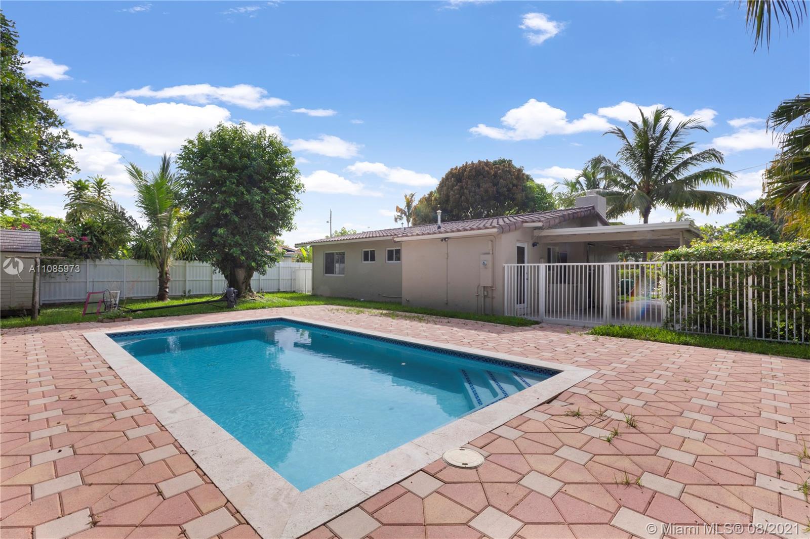 12501 Southwest 84th Avenue Road Miami, FL 33156 - Photo 2 of 20 a view of outdoor space yard swimming pool and patio