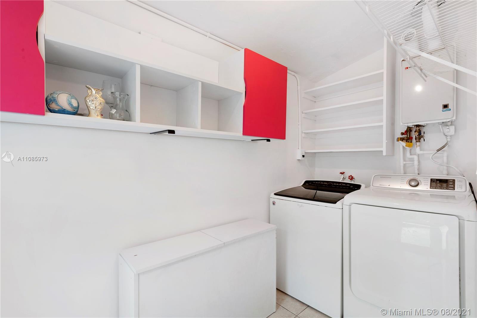 12501 Southwest 84th Avenue Road Miami, FL 33156 - Photo 17 of 20 a utility room with dryer and washer