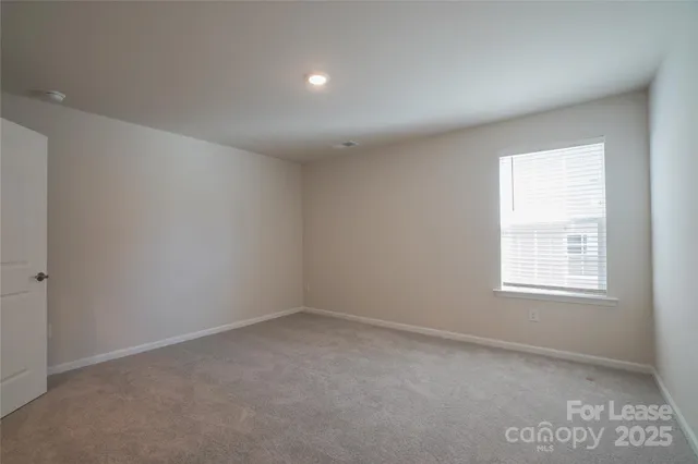 an empty room with an entryway