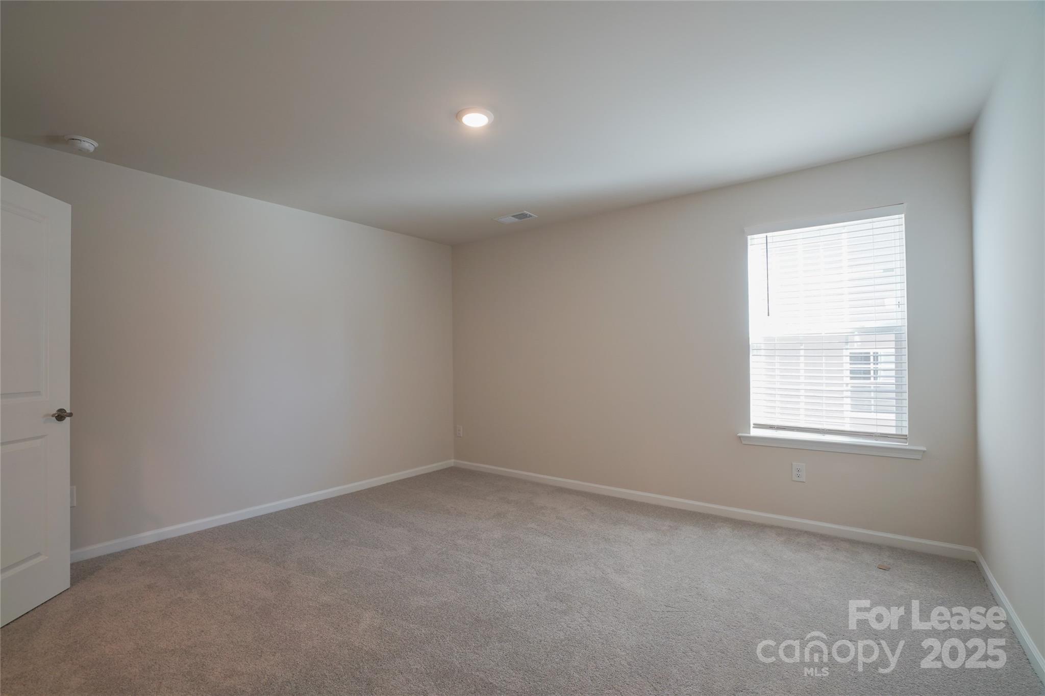 1411 Caracara Court Belmont, NC 28012 - Photo 19 of 29 an empty room with a window