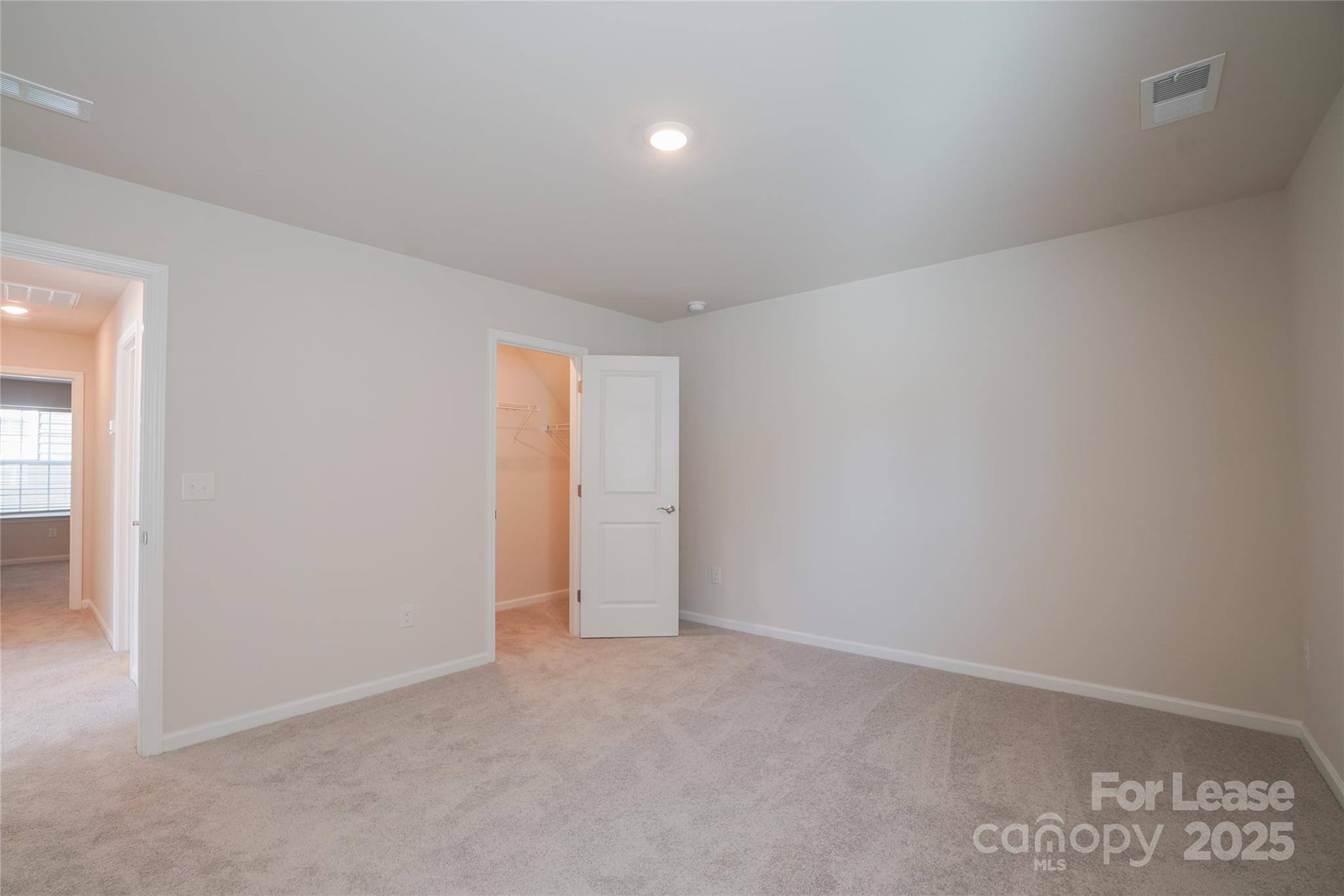 1411 Caracara Court Belmont, NC 28012 - Photo 20 of 29 an empty room with an entryway