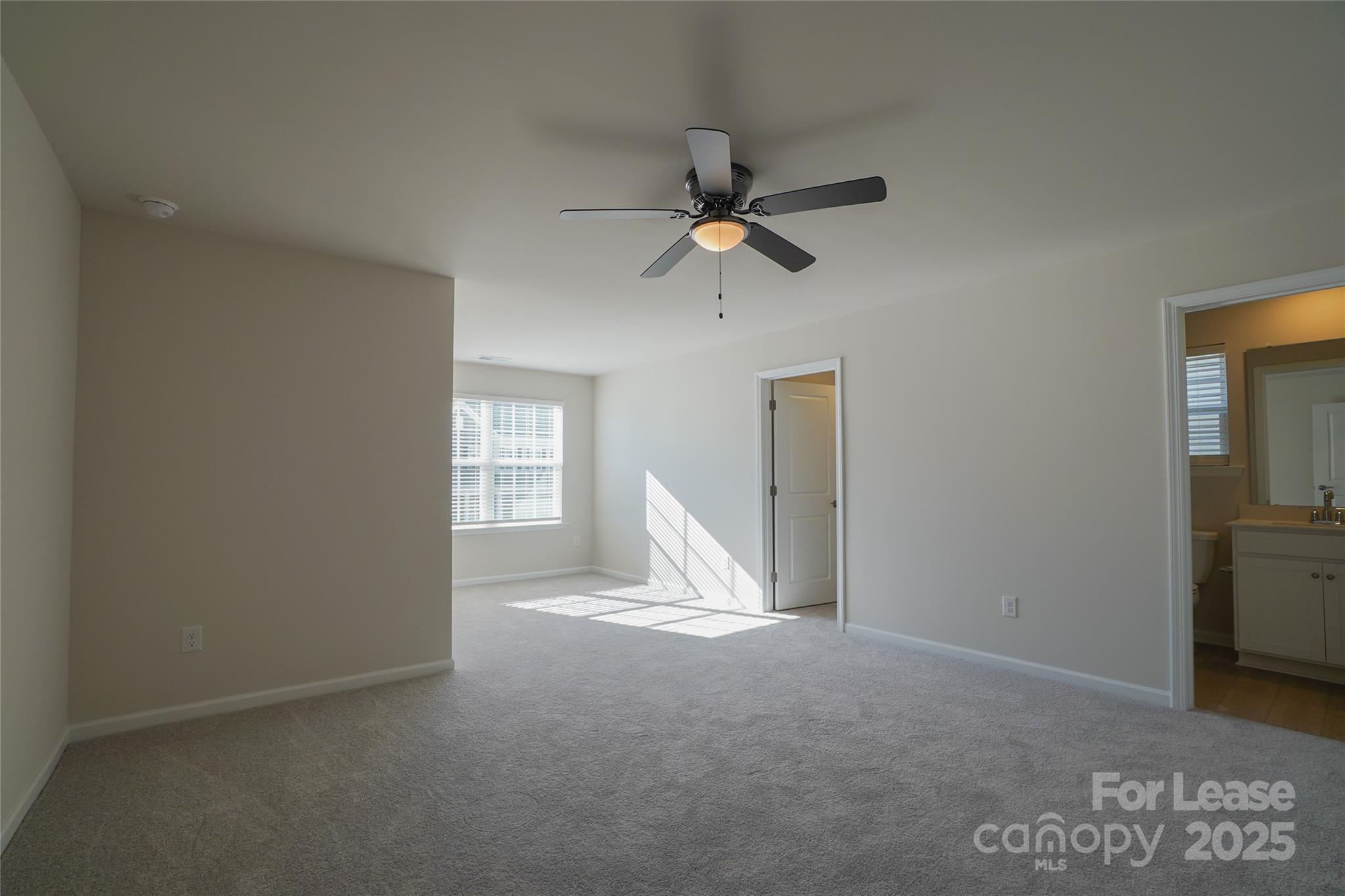1411 Caracara Court Belmont, NC 28012 - Photo 22 of 29 a view of empty room with ceiling fan