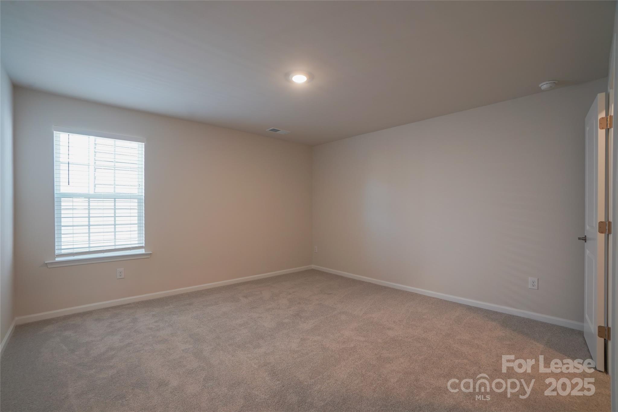 1411 Caracara Court Belmont, NC 28012 - Photo 26 of 29 an empty room with a window