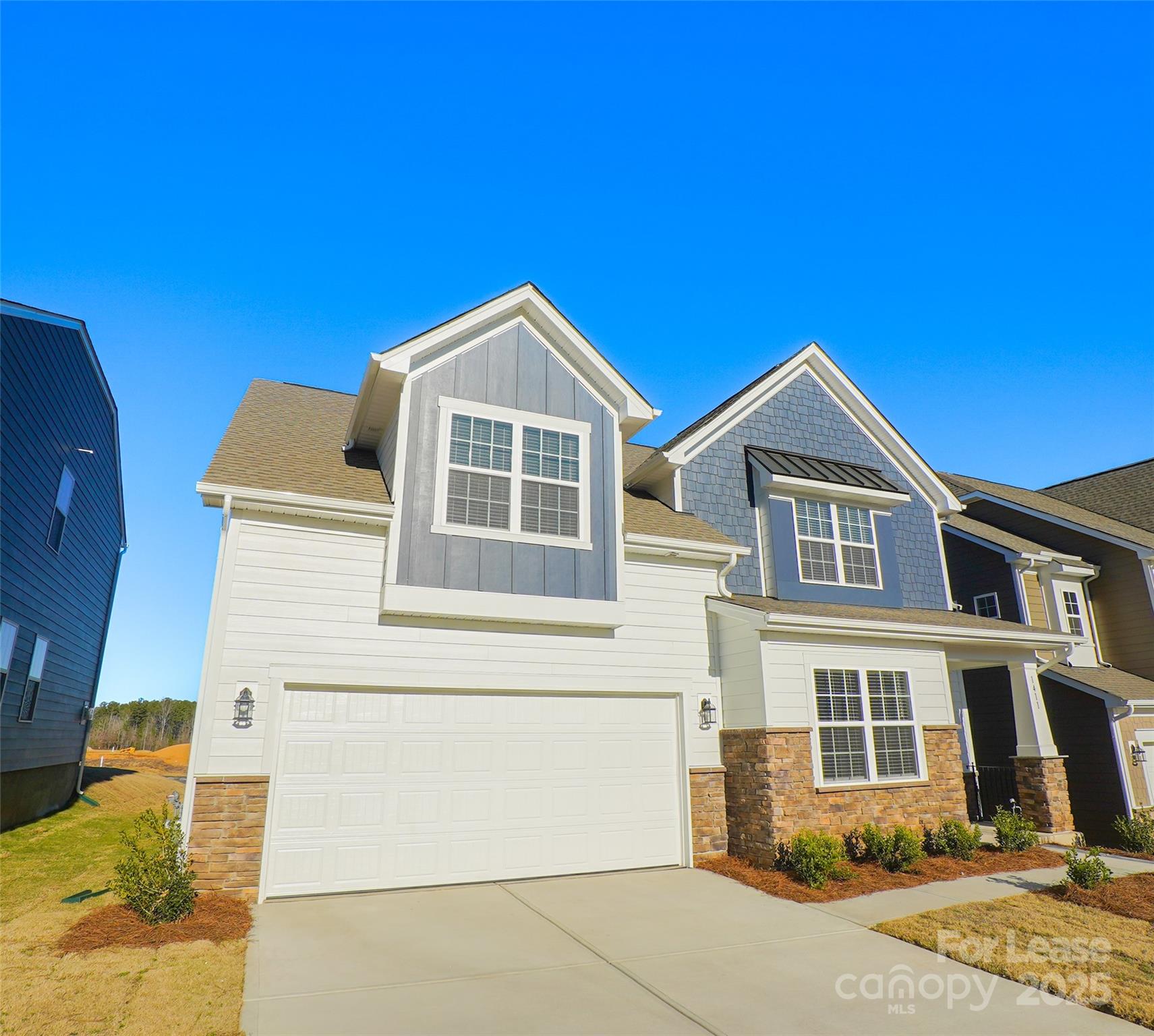 1411 Caracara Court Belmont, NC 28012 - Photo 28 of 29 a front view of a house with a yard
