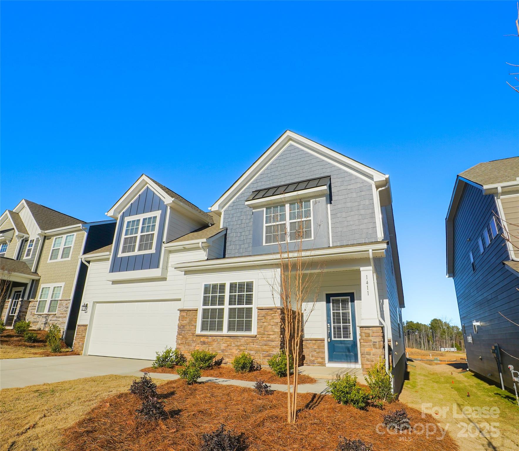 1411 Caracara Court Belmont, NC 28012 - Photo 29 of 29 a front view of a house with a yard