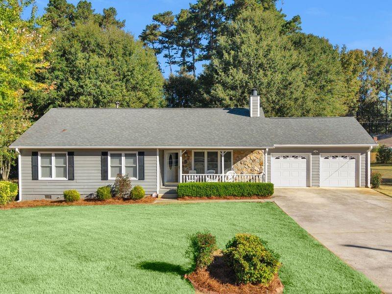 front view of a house with a yard