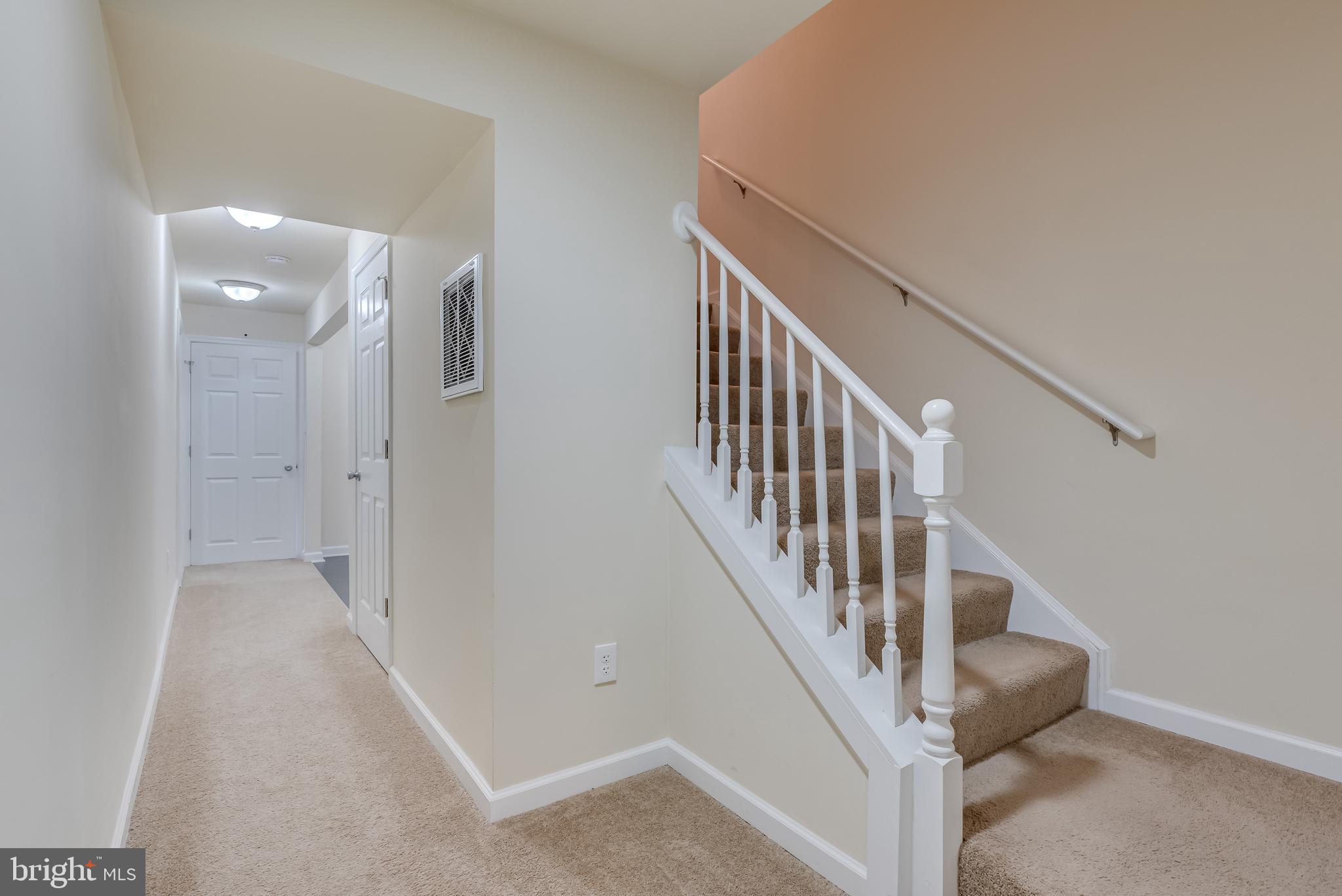 20 Baltic Lane Ranson, WV 25438 - Photo 22 of 26 Basement Hallway