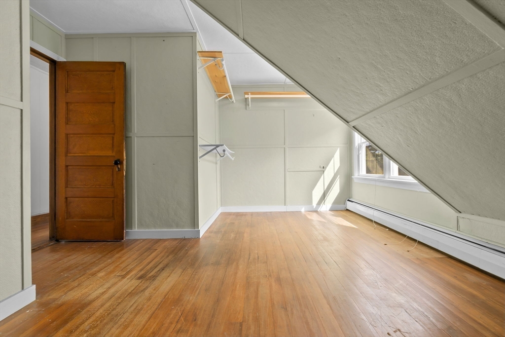 326 William Street Stoneham, MA 02180 - Photo 23 of 39 a view of an empty room and wooden floor
