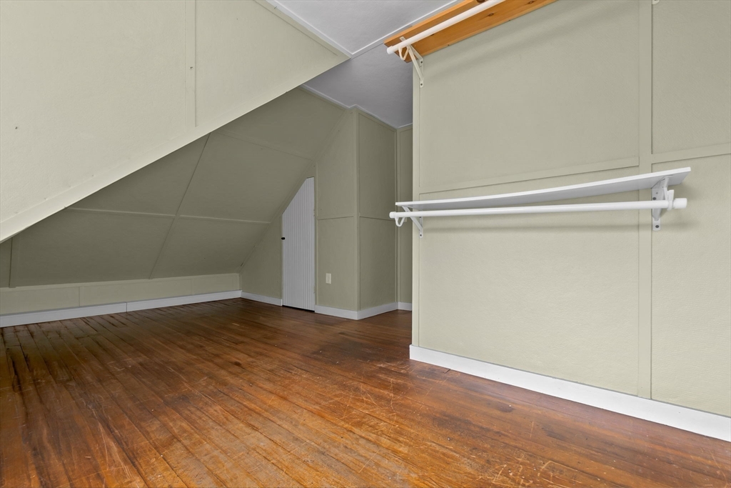 326 William Street Stoneham, MA 02180 - Photo 24 of 39 a view of an empty room with wooden floor