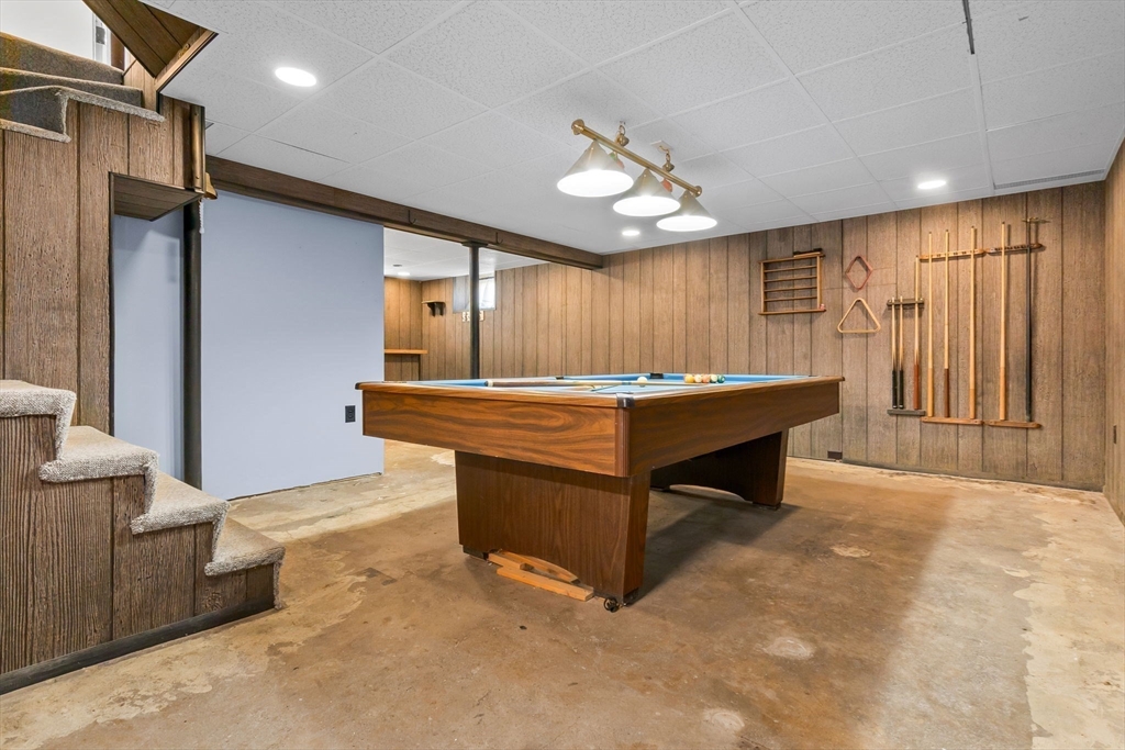 326 William Street Stoneham, MA 02180 - Photo 25 of 39 a room with pool table and furniture