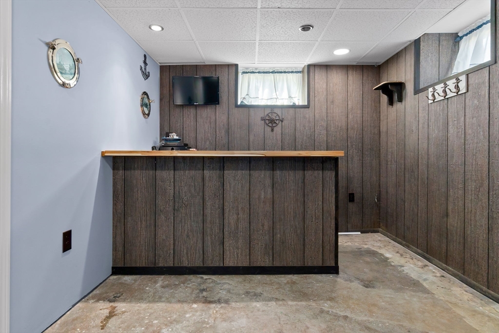 326 William Street Stoneham, MA 02180 - Photo 29 of 39 a view of a hallway with wooden floor and staircase