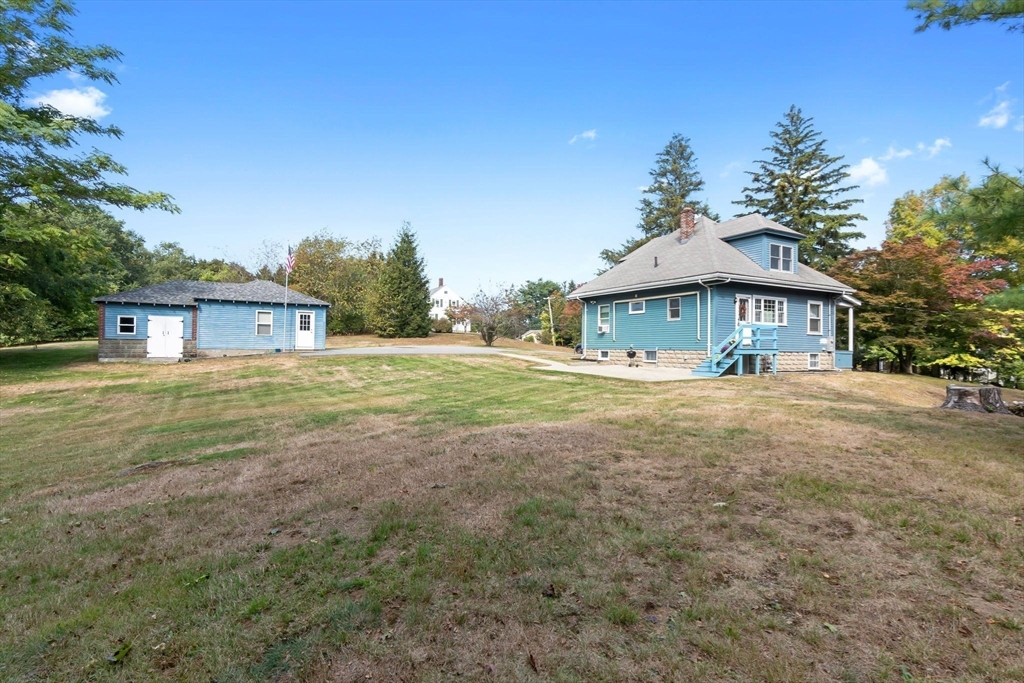 326 William Street Stoneham, MA 02180 - Photo 33 of 39 a front view of a house with garden