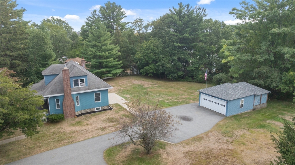 326 William Street Stoneham, MA 02180 - Photo 37 of 39 a view of a house with a yard and large tree