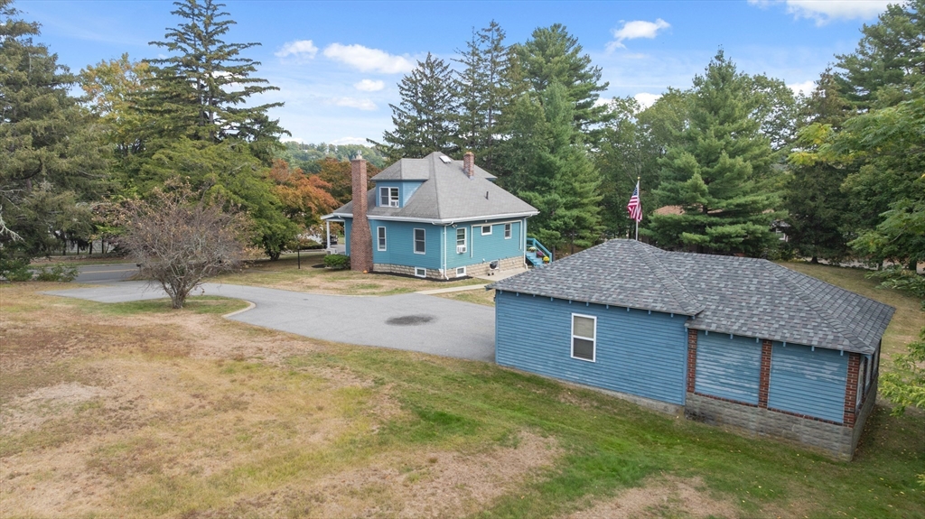 326 William Street Stoneham, MA 02180 - Photo 38 of 39 a aerial view of a house next to a yard