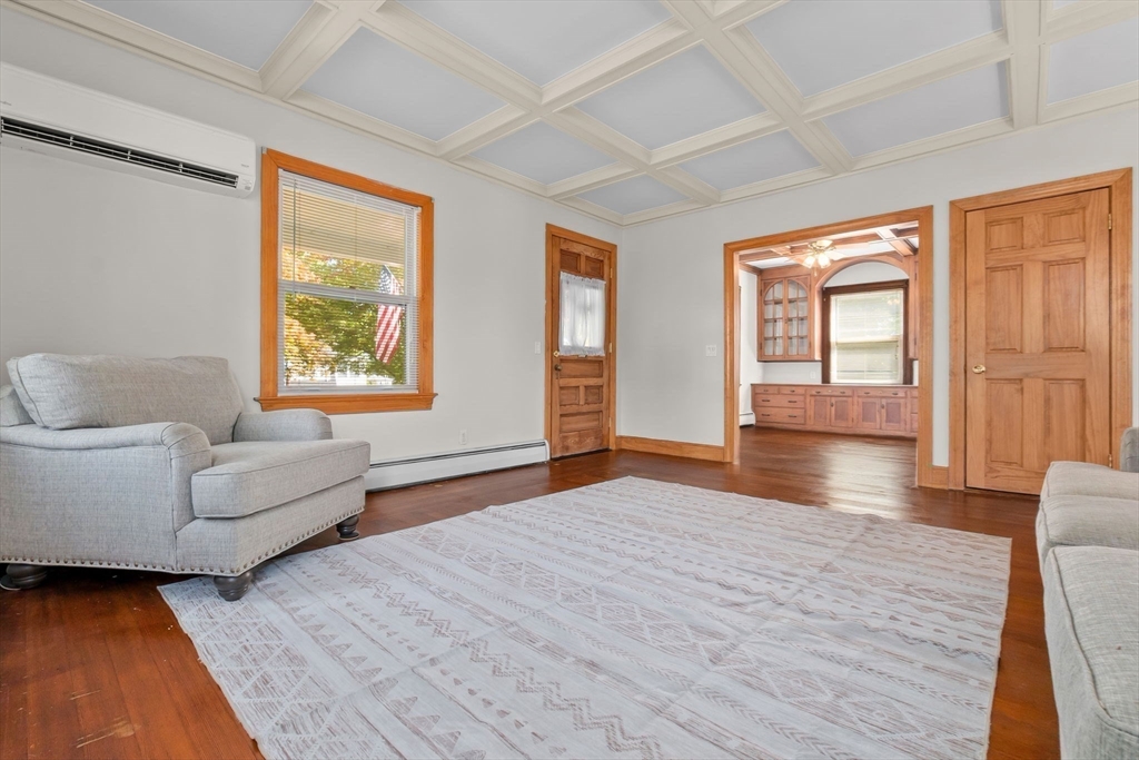 326 William Street Stoneham, MA 02180 - Photo 6 of 39 a living room with furniture and a window