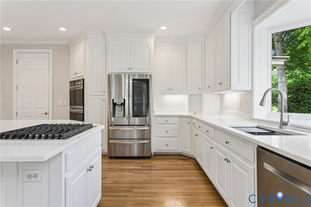 3009 Travis Pond Road Williamsburg, VA 23185 - Photo 35 of 100 Bright kitchen featuring white cabinetry, light co